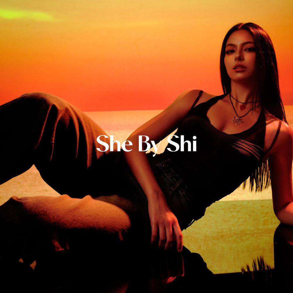 She by Shi